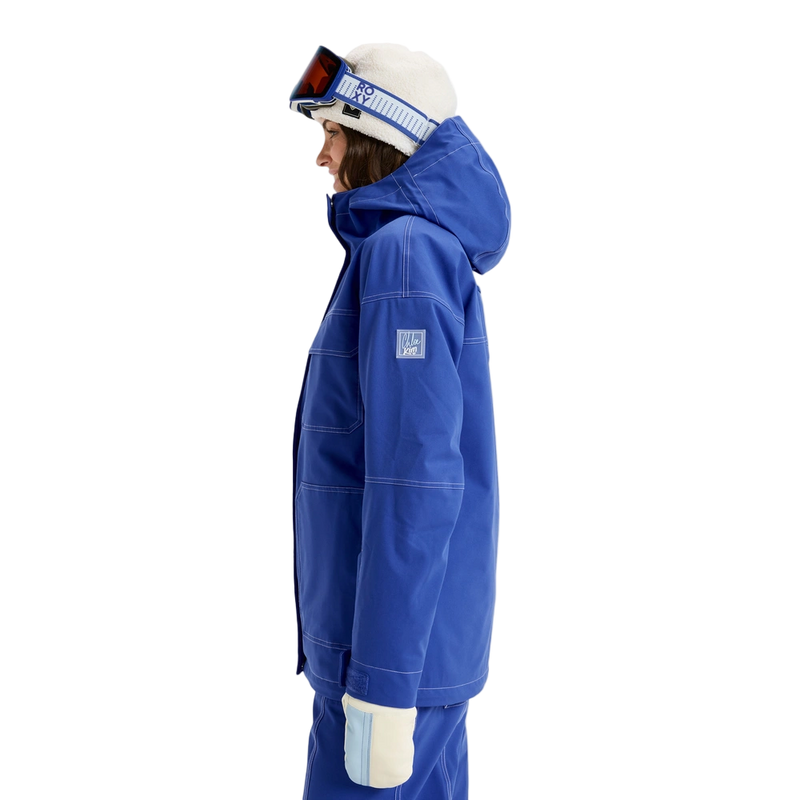 Side image of the Chloe Kim Snowboard Jacket - Womens in Dazzling Blue