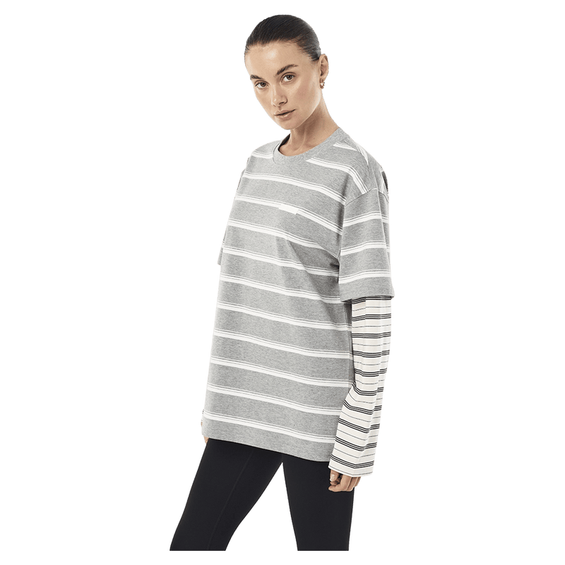 Side view of P.E Nation Spark LS Tee - Womens in colour Grey Marle Stripe.