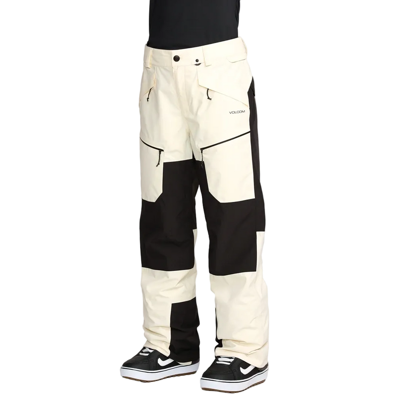 Front image of the The Volcom Stone Mica 20K Snowboard Pants – Womens in Bone colourway. Features contrast black knee, inner cuff and upper backside patches; zip and button fastening, belt loops and hip and thigh zip pockets