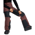 Image of the The Volcom Stone Mica 20K Snowboard Pants – Womens in Oxblood colourway. Features contrast black knee, inner cuff and upper backside patches; zip and button fastening, belt loops, hip and thigh zip pockets, and inner thigh vents with zip closure.
