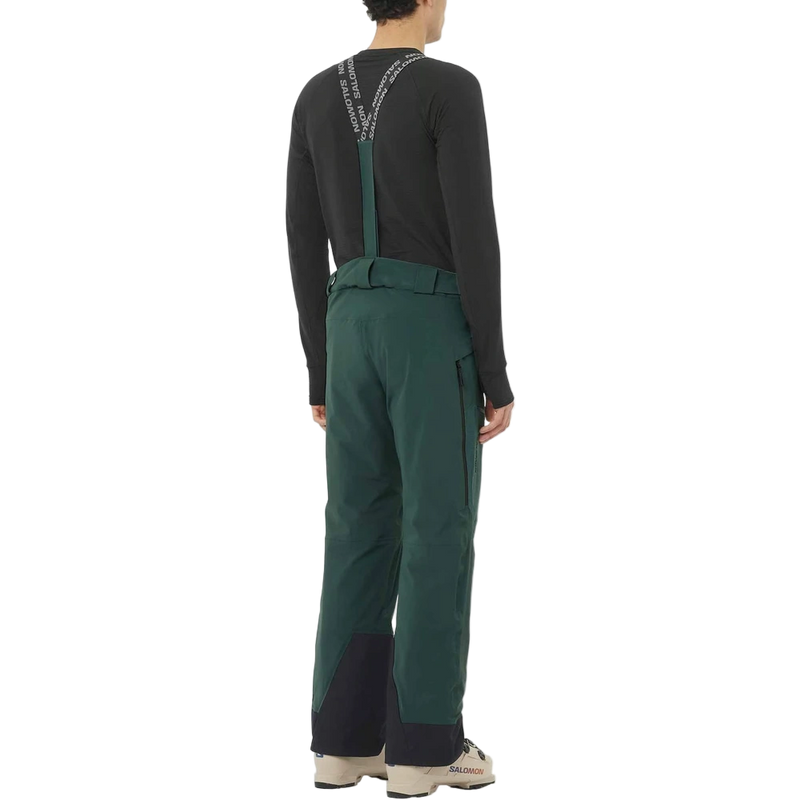 Full-body back view of the Salomon 2026 Brilliant Pant in Green Gables colourway, men's model.