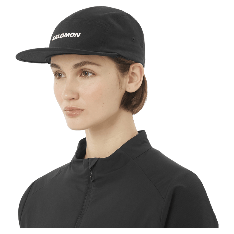 Worm view of the Salomon 5 Panle Cap in Deep Black colourway, unisex model
