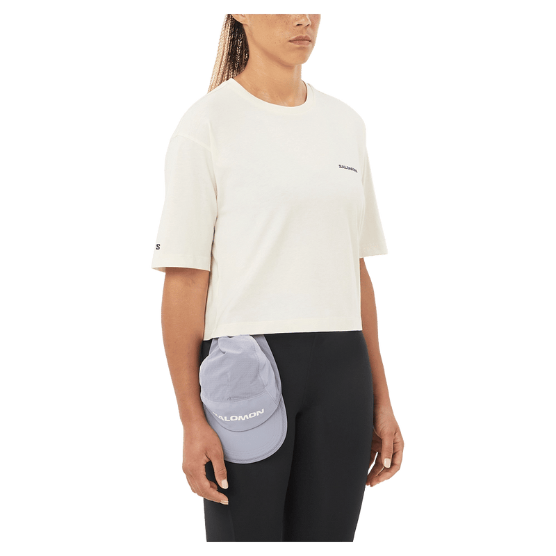 Front view of the Salomon Short SS Relaxed Tee in White colourway, women model