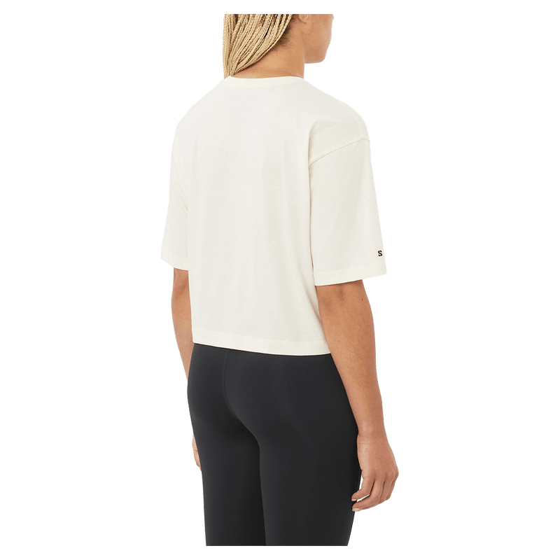 Back view of the Salomon Short SS Relaxed Tee in White colourway, women model