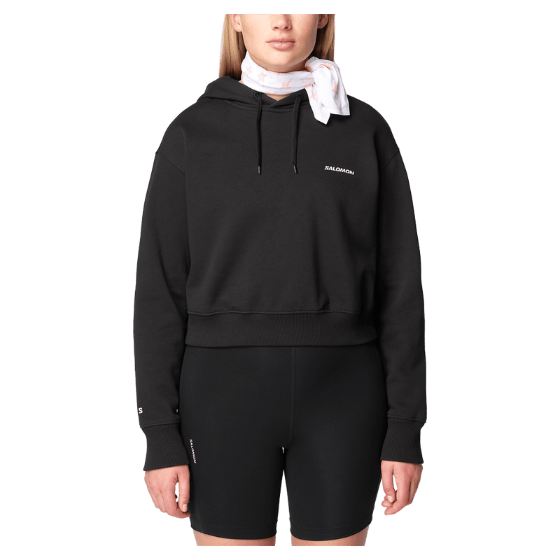 Front view of the Salomon Short Hoodie in Black colourway, women model
