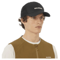 Worn view of the Salomon Trucker Cap in Deep Black colourway, unisex model