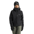Front view of a woman wearing the Sentinel Ski Jacket in Black featuring a full zip front and silver grey embroidered logo on the chest. 