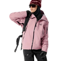 Front view of a woman wearing the Sentinel Ski Jacket in Bliss Black featuring  a full zip front, underarm zip vent, zip pockets at the sides and sleeve, and adjustable cuffs. 