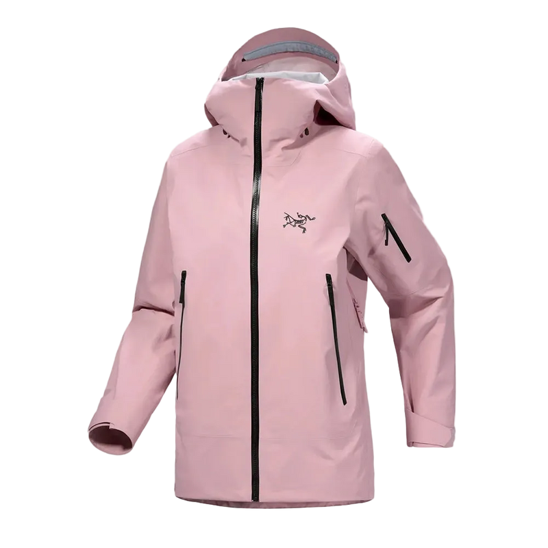 Front view of the Sentinel Ski Jacket in Bliss Black, featuring a storm hood with toggle adjustment, a full zip front, underarm zip vent, zip pockets at the sides and on the sleeve, adjustable cuffs, and a blush pink tone with contrast black hardware and logo on the chest.