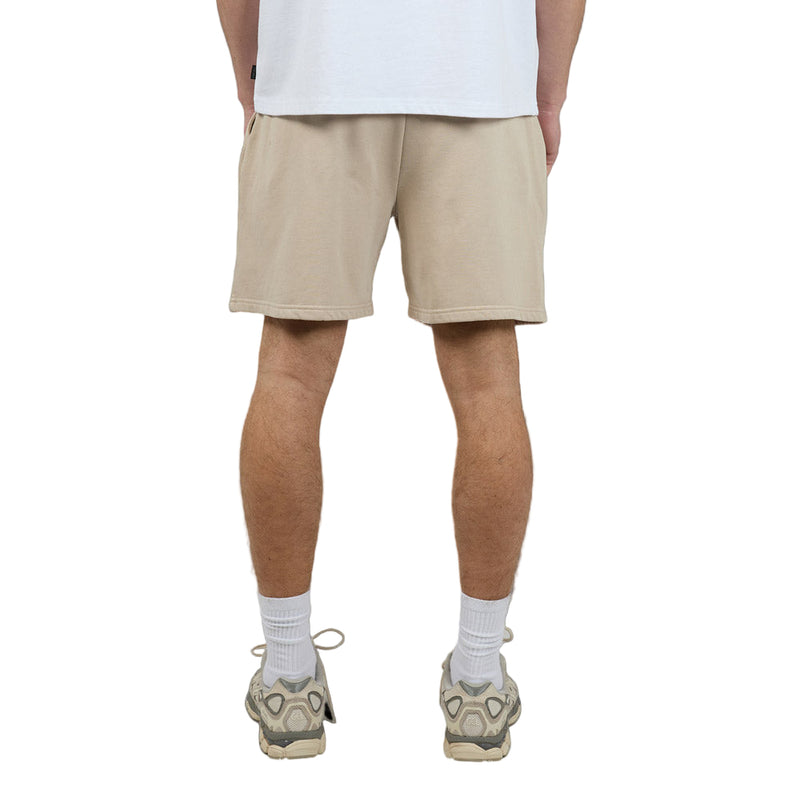 Back view of Man wearing Silent Theory's Essential Theory Shorts in tan colourway