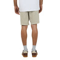 Back view of Man wearing Silent Theory Patch Pocket Shorts in brown colourway