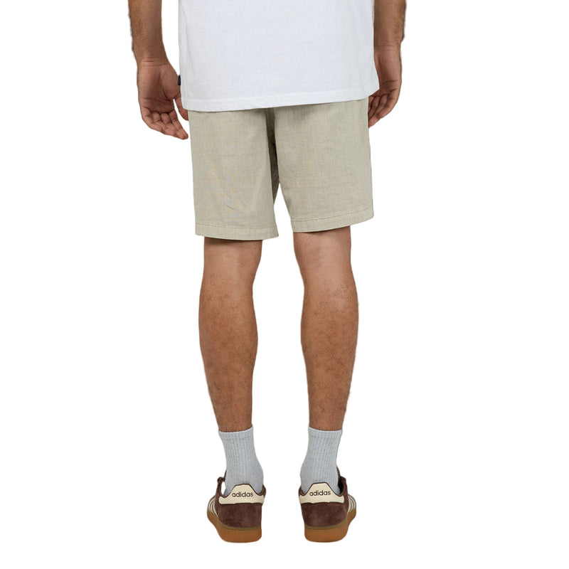 Back view of Man wearing Silent Theory Patch Pocket Shorts in brown colourway