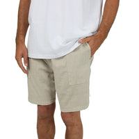 Pocket view of Silent Theory Patch Pocket Shorts in brown colourway