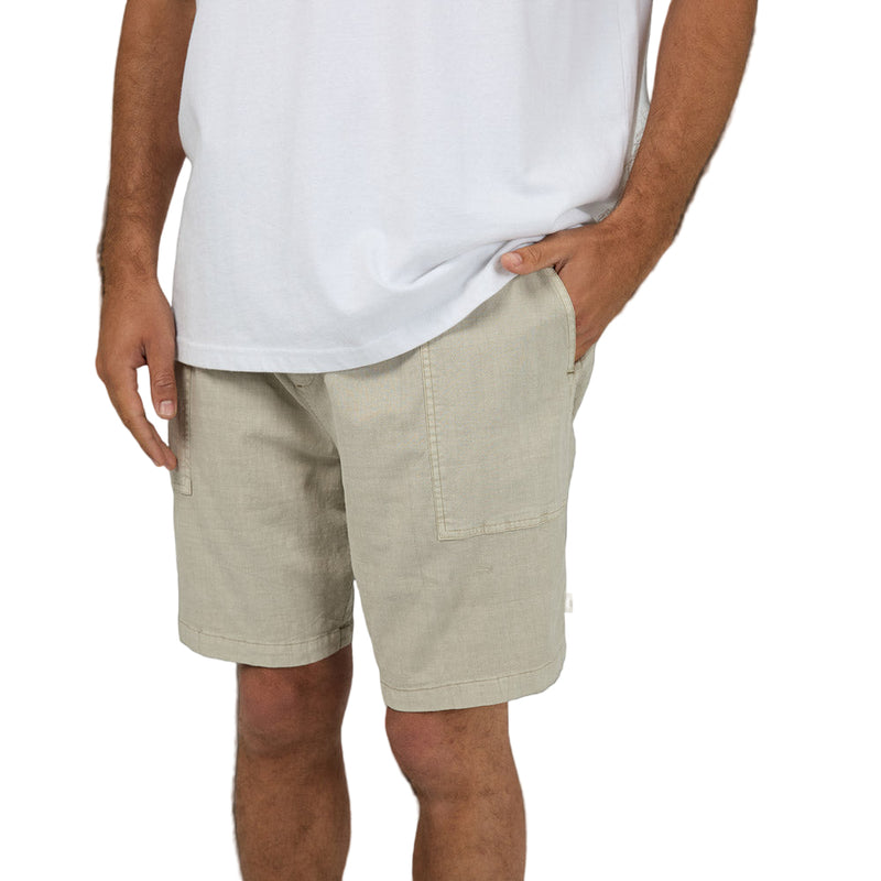 Pocket view of Silent Theory Patch Pocket Shorts in brown colourway