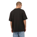 Back view of man wearing Silent Theory Heavy Weight Tee in washed black