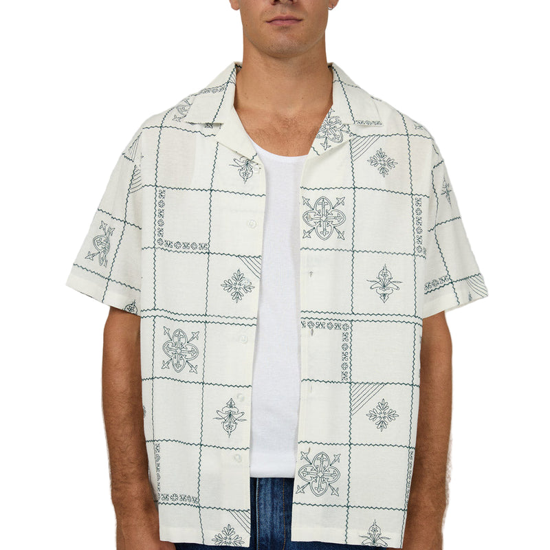 Close view of Man wearing Silent Theory's Icon SS Shirt in white colourway
