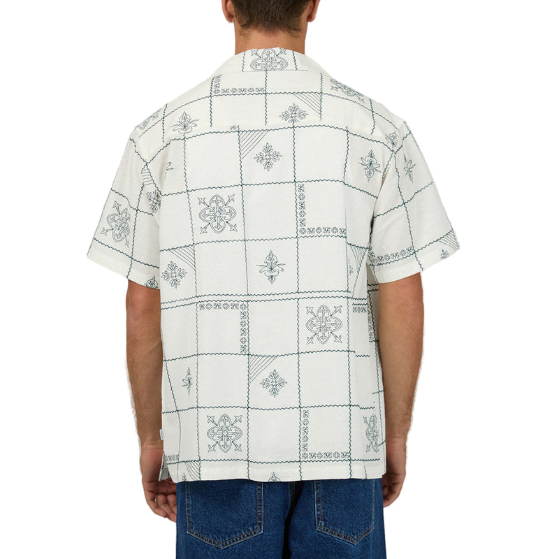 Back view of  Man wearing Silent Theory's Icon SS Shirt in white colourway