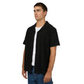 Man wearing Luca SS Shirt in washed black colurway