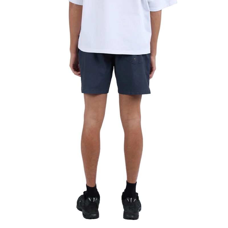 Back view of Man wearing Silent Theory Tres Shorts in navy colourway