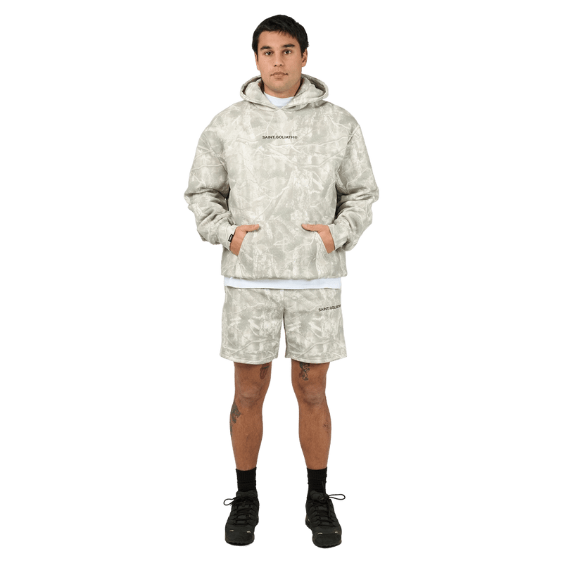 Full-body view of the St Goliath Tree Cammo Hoodie in Multi colourway, men's model