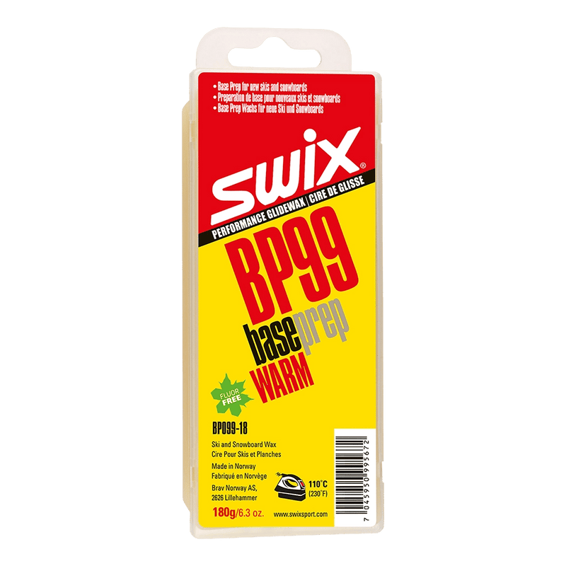 Swix BP99 Base Prep Warm fluor-free ski wax in a rectangular plastic container with a yellow and red label.