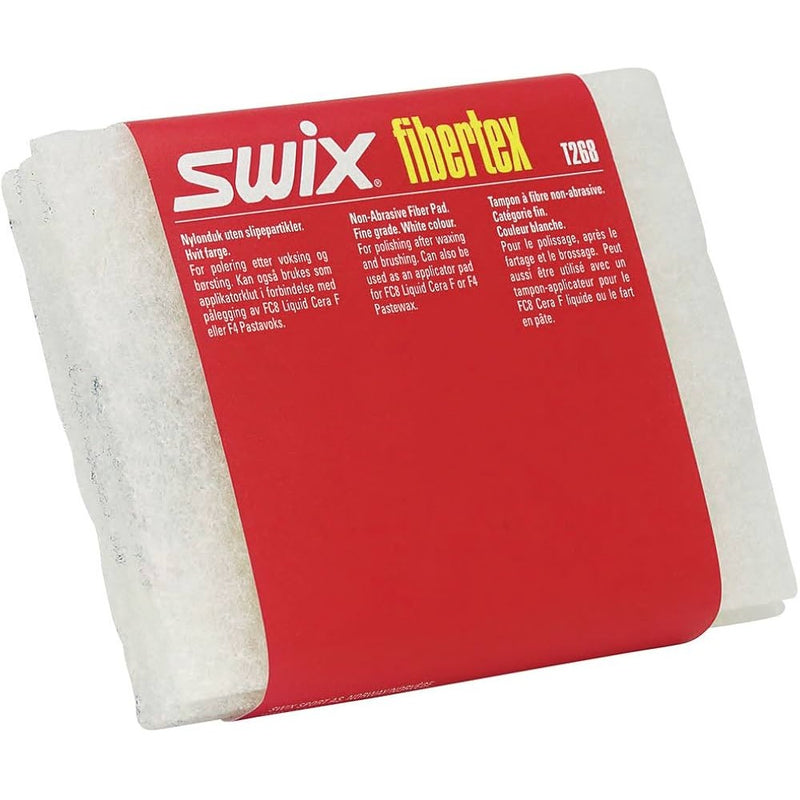 Two White Fibertex Pads wrapped in red paper with Swix information