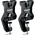A pair of Swix Tuning vise in black ballistic plastic with silver metal screws vises