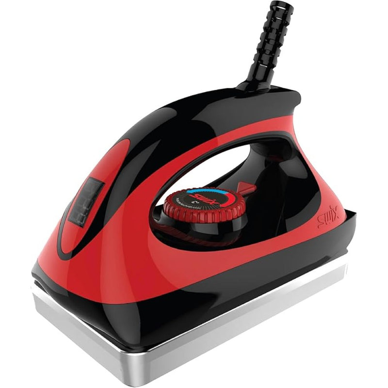 Red and black Swix wax iron with a thick metal base, digital display, and adjustable temperature dial.