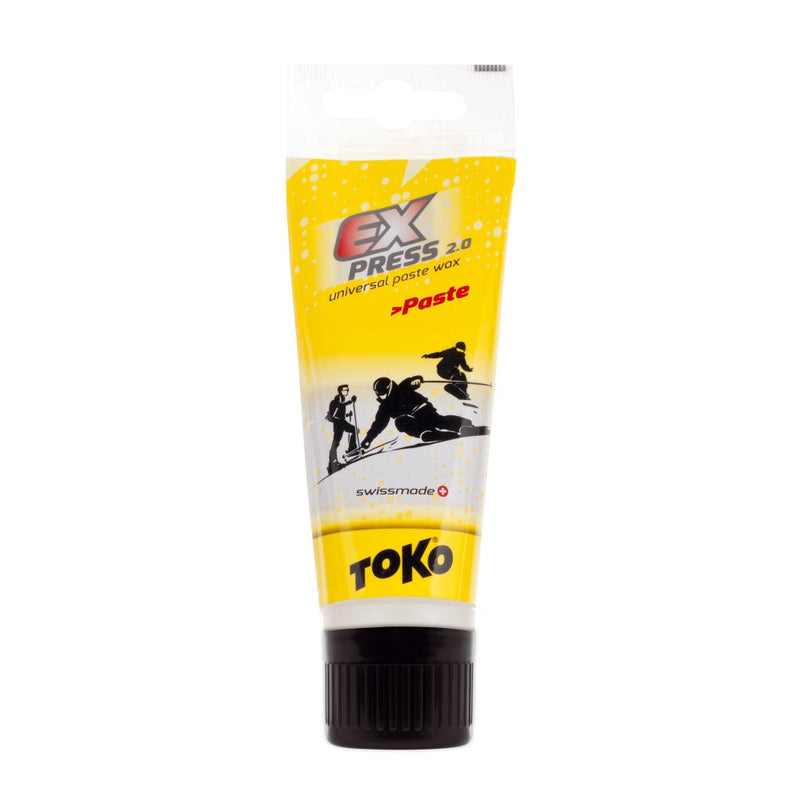 Plastic clear tube of Toko Universal Paste wax with black lid and yellow graphics showing information on wax