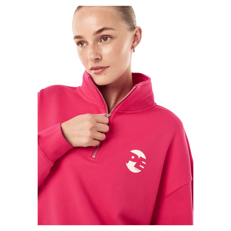Close view of P.E Nation Voltage Quarter Zip - Womens in colour Cosmo Pink.