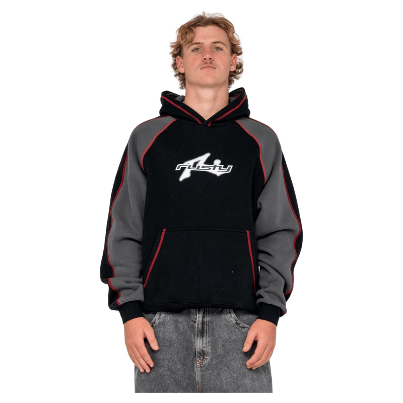 View of man in Rusty Paneka Hooded Fleece in colour Black