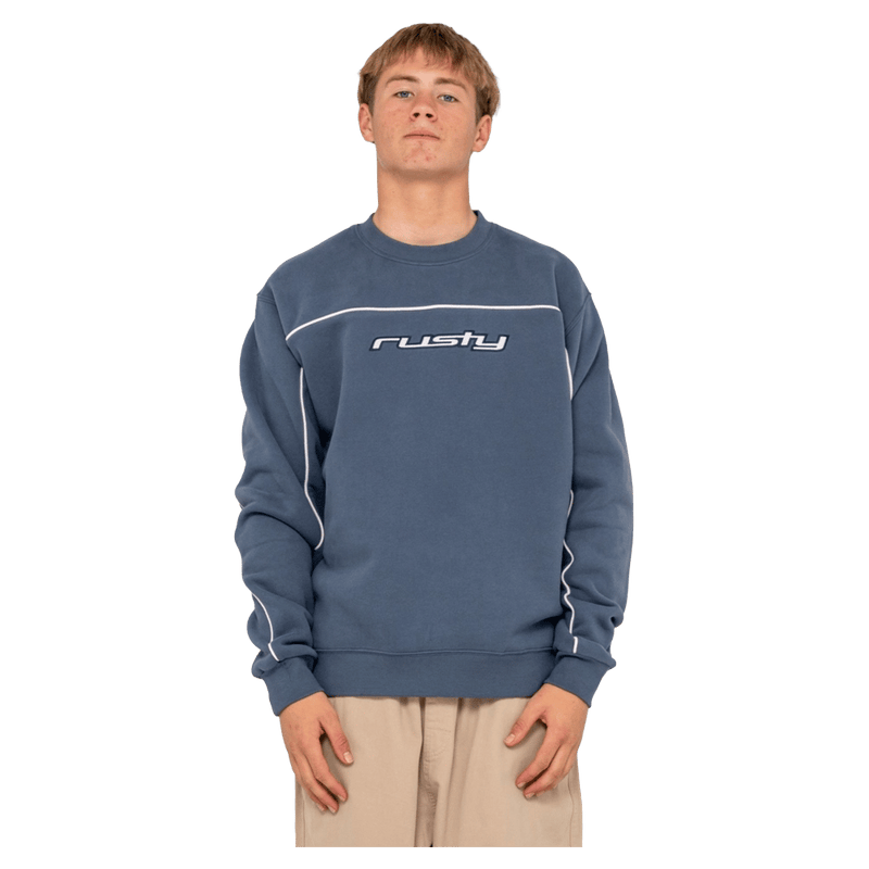 View of man in Rusty Trigger Crew Fleece in colour Atlantic Blue