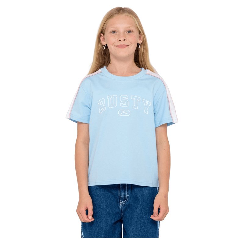 View of girl in Rusty Girls Team Varity Standard Tee in colour Vintage Blue