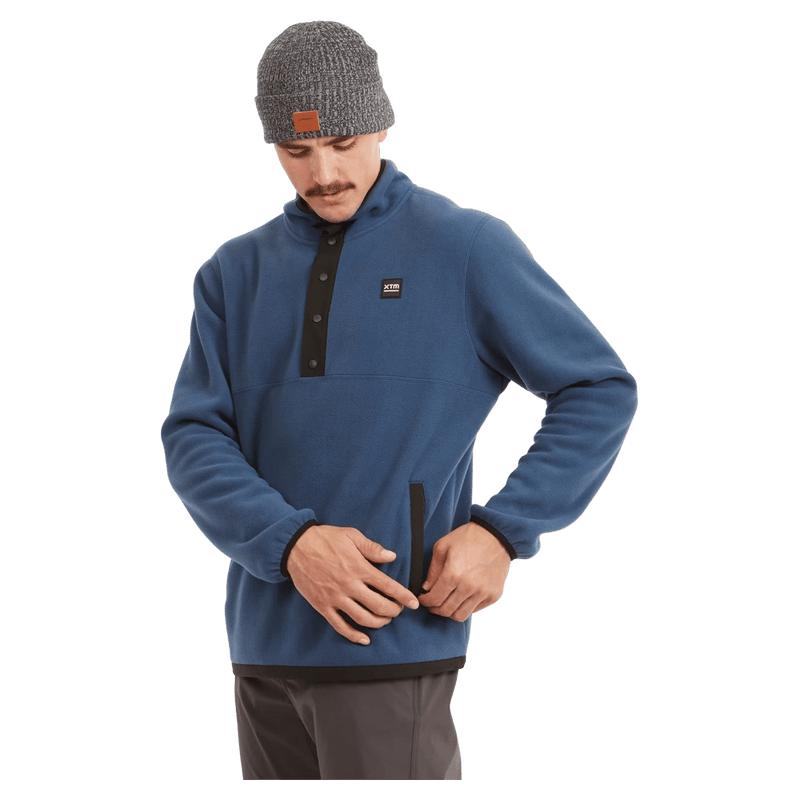 Side view of the XTM Frazer Pullover in Steal Blue colourway, unisex's model