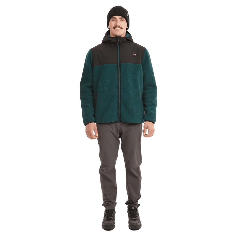 Full-body view of the XTM Treachery Fleece Jacket in Pine colourway, unisex's model