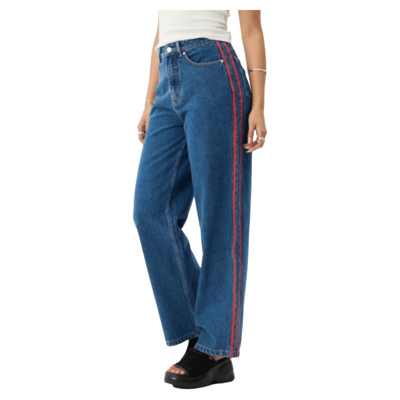 Side view of Afends Bella Stripe Denim Wide Leg Baggy Jean - Womens in colour Authentic Blue.
