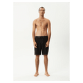 Afends Surf Related V2 black fixed waist boardshorts with drawstring worn by a man on a white background.