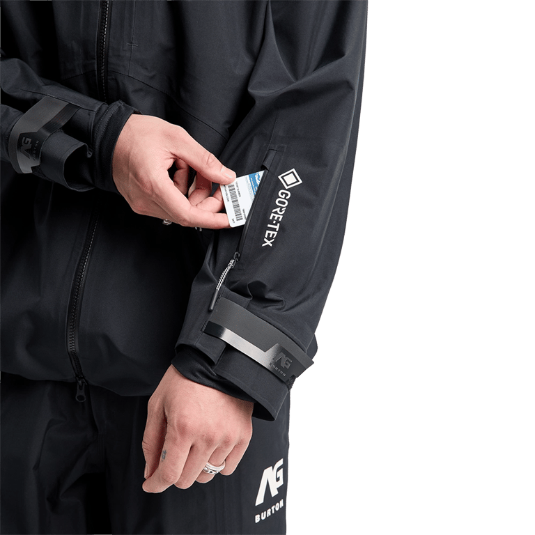 Black Analog Hardpack 3L Snowboard Jacket sleeve with GORE-TEX logo and a zippered forearm lift pass pocket.