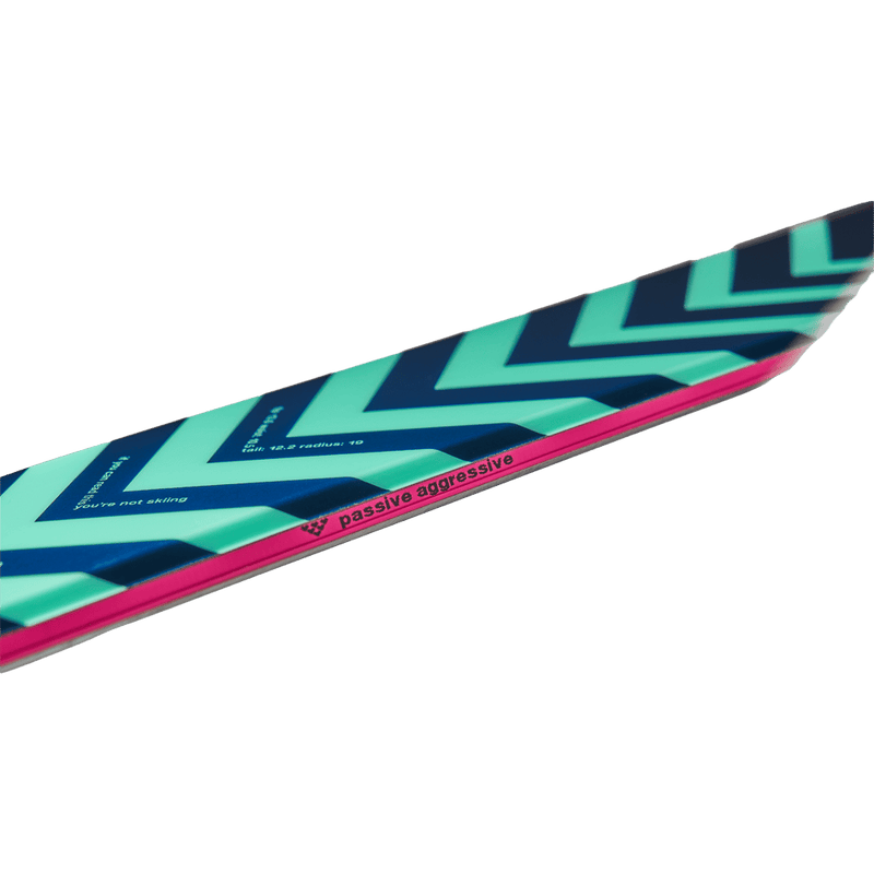Edge view of the Black Crows Atris Birdie Ski in Turquose colourway, women's model