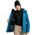 Woman wearing a blue Burton AK Upshift Gore-Tex 2L Snowboard Jacket unzipped to show the interior lining and mesh pocket.