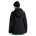 Rear view of a black Burton AK Upshift Gore-Tex 2L Women's Snowboard Jacket with a hood and black beanie.