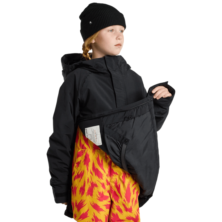 Black Burton Frostner Anorak Snowboard Jacket for kids showing the interior lining and front pocket flap.