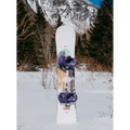 Burton Hideaway Womens Snowboard with purple bindings and mountain graphics standing in a snowy landscape.
