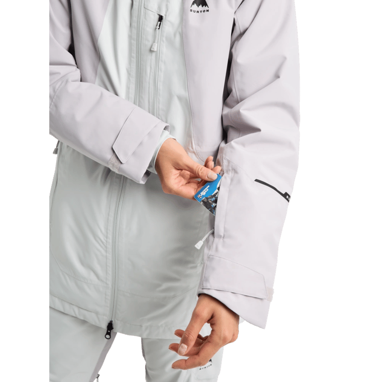 Light purple Burton Reserve Insulated Snowboard Jacket for women showing the zippered sleeve pass pocket.