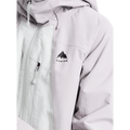 Close-up of a light purple and white Burton Reserve Insulated Snowboard Jacket for women with black chest logo and zippers.