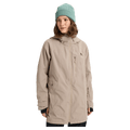 Women's beige Burton Reserve Insulated Snowboard Jacket with a long fit, hood, and chest pocket on a model in a teal beanie.