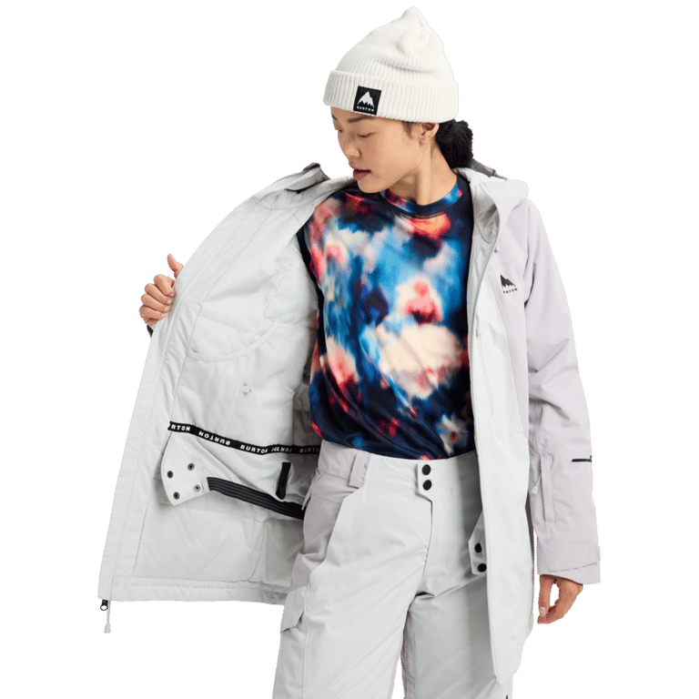 Women's light grey Burton Reserve Insulated Snowboard Jacket showing quilted interior lining and powder skirt.