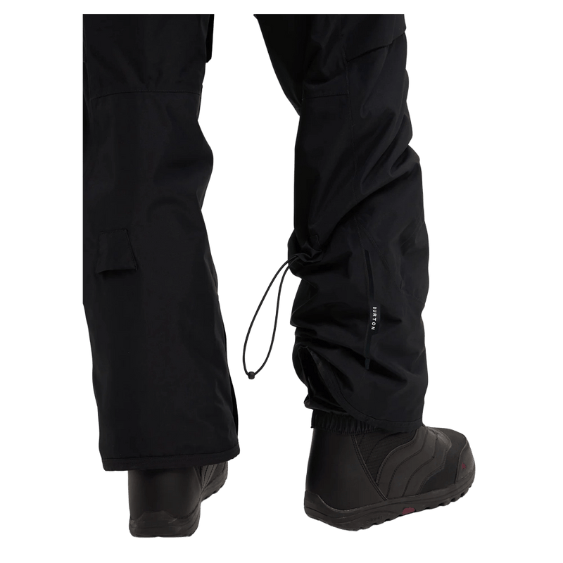 Black Burton Reserve insulated snowboard pants featuring an adjustable rear leg cinch cord and boot cuffs.