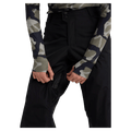 Close-up of black Burton Reserve women's snowboard pants showing a zippered, mesh-lined inner thigh vent.