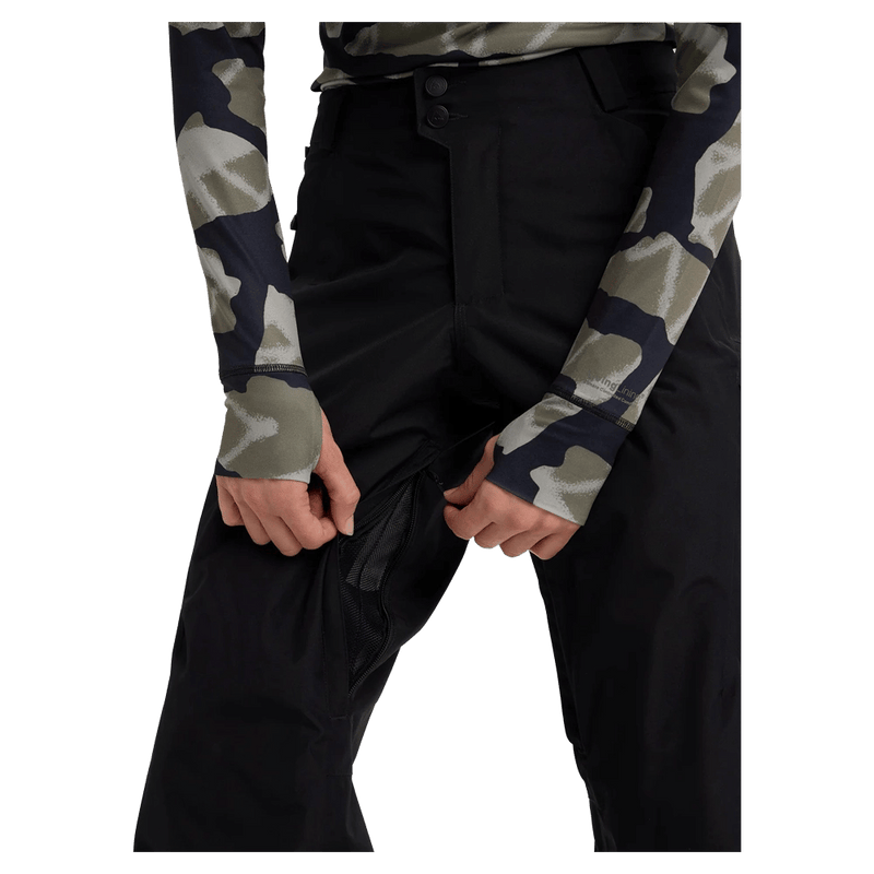 Close-up of black Burton Reserve women's snowboard pants showing a zippered, mesh-lined inner thigh vent.